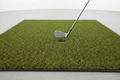 Premium golf simulator mat with realistic turf